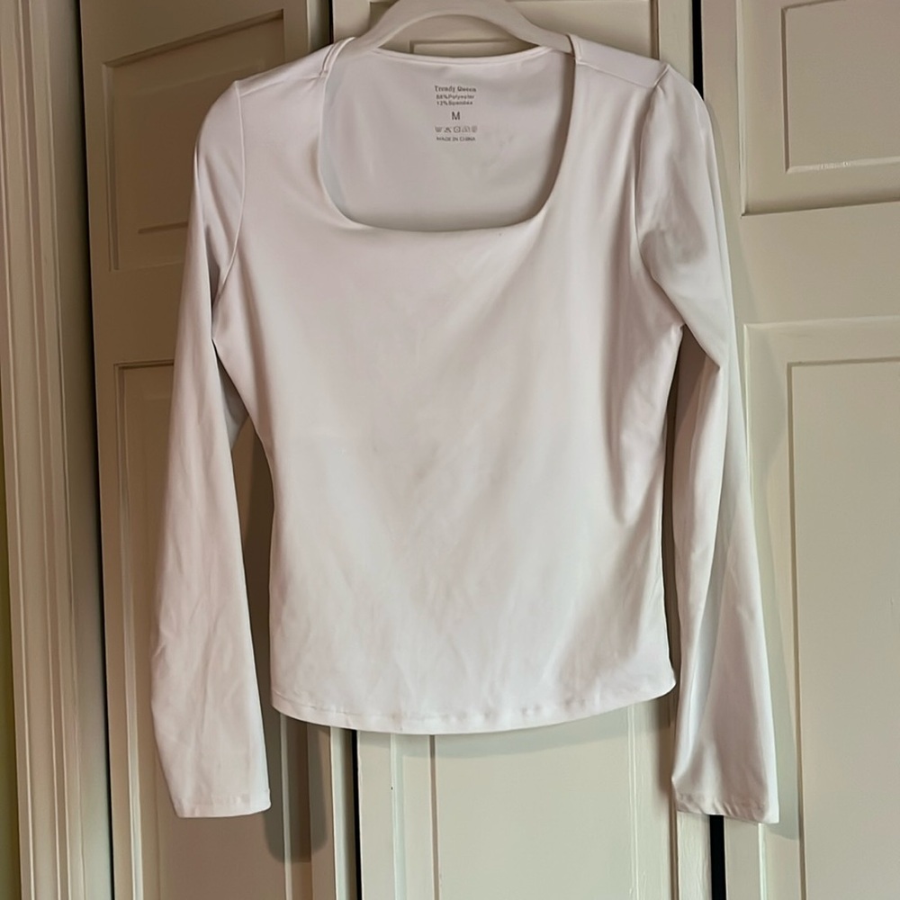 Woman’s white square neck top